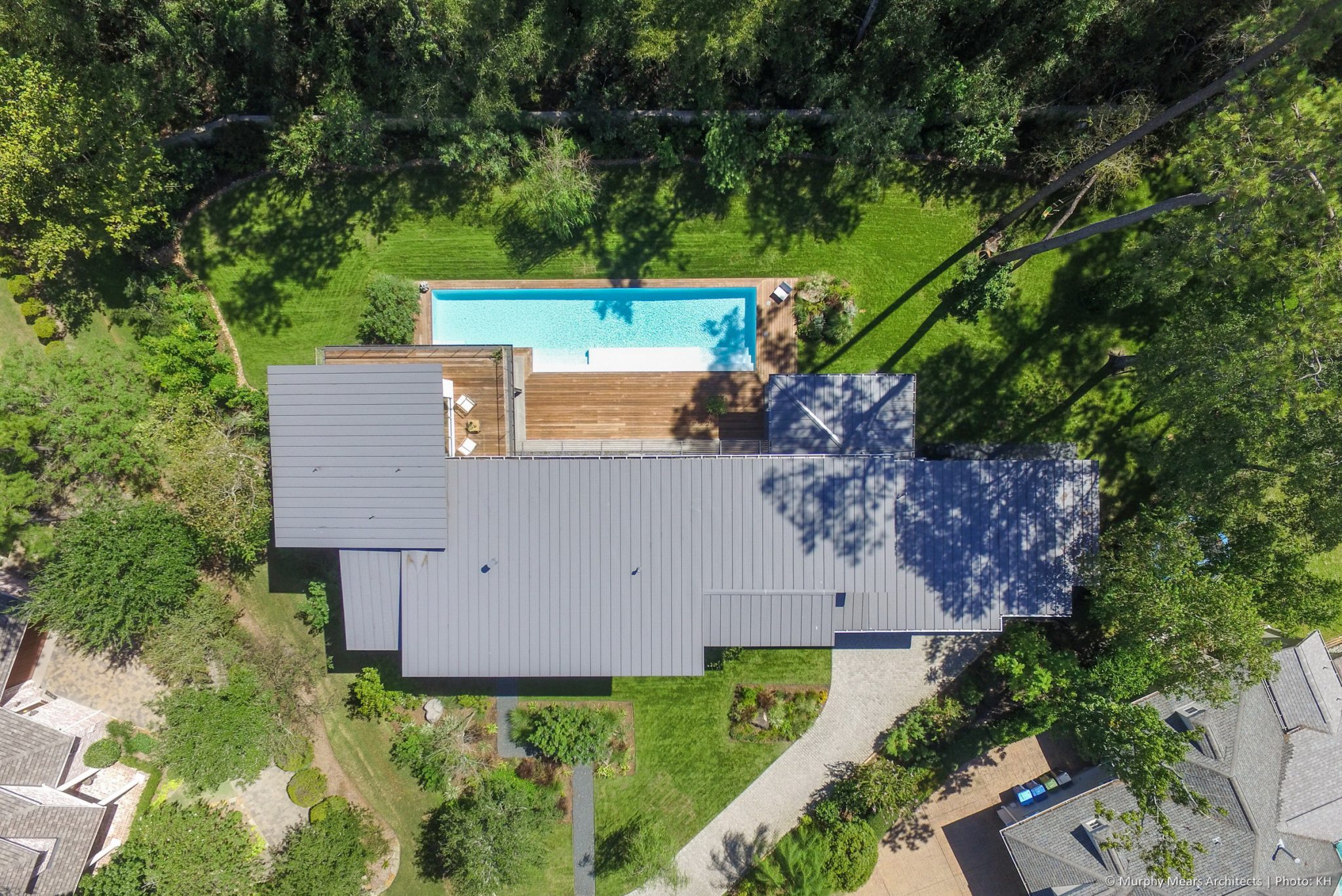 Carlton Woods Residence - Standing seam metal roof, oriented south for solar panels.